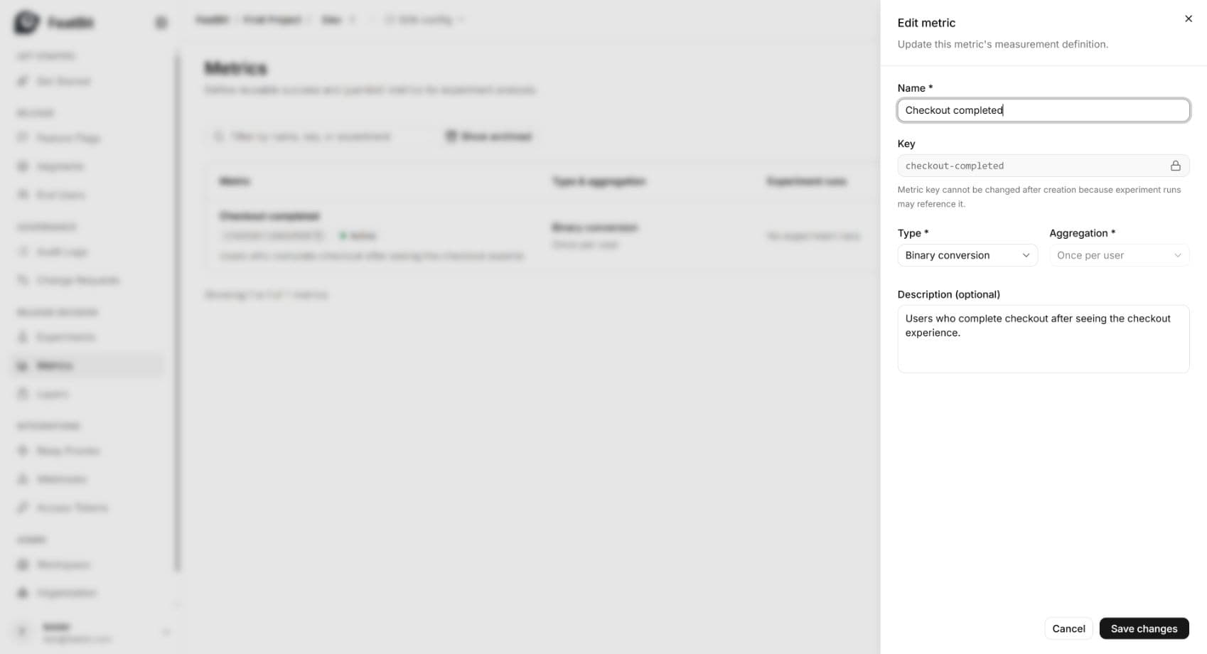 Reopened Checkout completed editor showing its saved description and immutable metric key